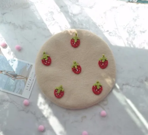 Stylish Beige Beret Hat with Strawberry Accent